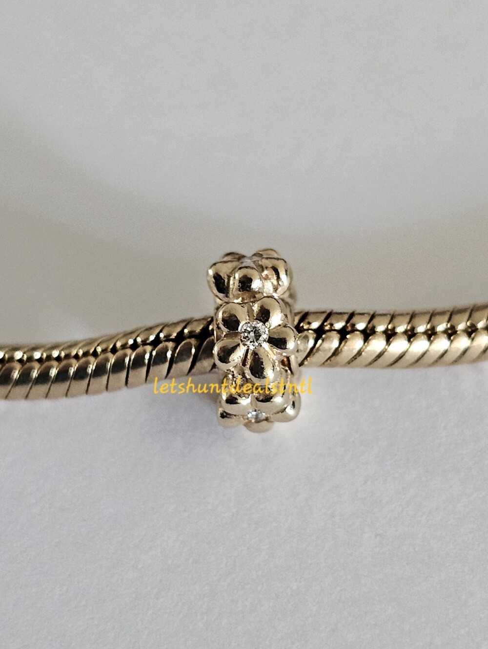 Pandora 14K Gold Flower Spacer with Diamonds. 750436D.